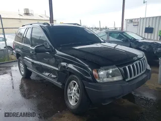 2004 Jeep Grand Cherokee Laredo with VIN 1J4GX48N94C435700, listed as a IAAI auction lot 41809624 with 147,413 mi miles. Bid and sale history available at carsss.com. Image 1.
