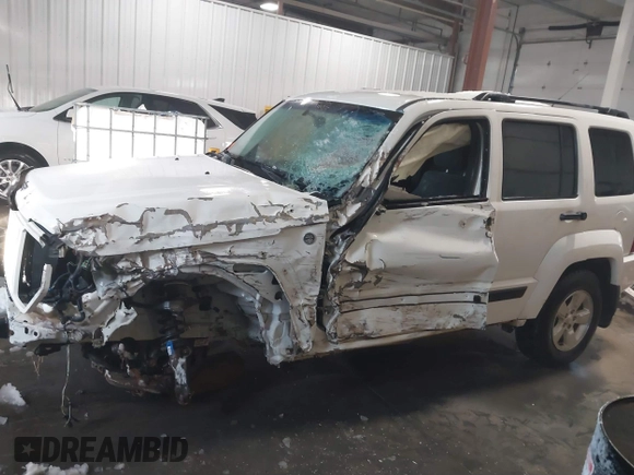 2010 Jeep Liberty Sport with VIN 1J4PN2GK4AW182488, listed as a IAAI auction lot 41312146 with 217,617 mi miles. Bid and sale history available at carsss.com. Image 6.