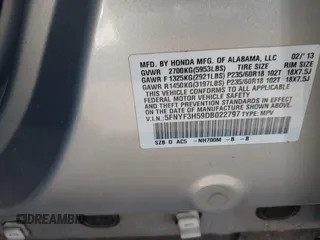 2013 Honda Pilot EX-L with VIN 5FNYF3H59DB022797, listed as a IAAI auction lot 41880675 with 206,359 mi miles and . Bid and sale history available at DreamBid. Image 9.