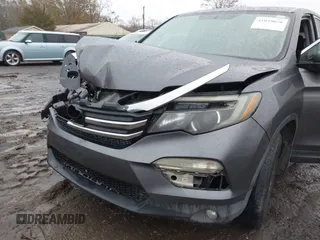 2017 Honda Pilot EX-L with VIN 5FNYF5H8XHB018480, listed as a IAAI auction lot 41049028 with 136,748 mi miles and . Bid and sale history available at DreamBid. Image 6.