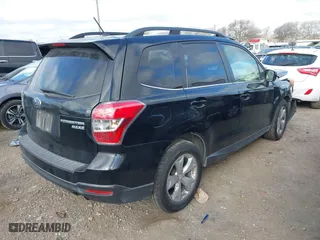 2014 Subaru Forester 2.5i Limited with VIN JF2SJAHC6EH460879, listed as a IAAI auction lot 41673548 with 114,950 mi miles. Bid and sale history available at carsss.com. Image 4.