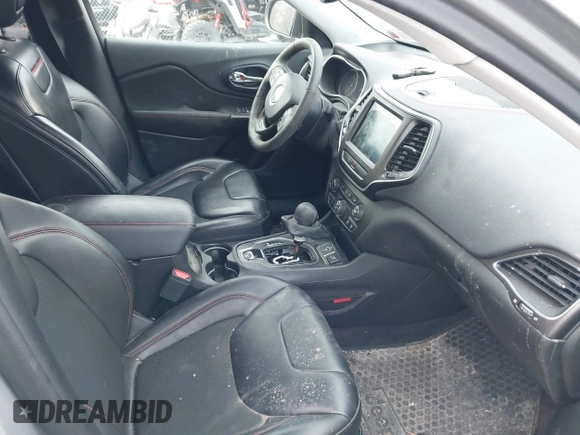2019 Jeep Cherokee Trailhawk with VIN 1C4PJMBX5KD103259, listed as a IAAI auction lot 41704861 with 39,923 mi miles and . Bid and sale history available at DreamBid. Image 5.