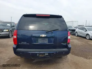 2009 Chevrolet Suburban LT w/2LT with VIN 1GNFC26JX9R280829, listed as a IAAI auction lot 41551580 with 214,351 mi miles. Bid and sale history available at carsss.com. Image 16.