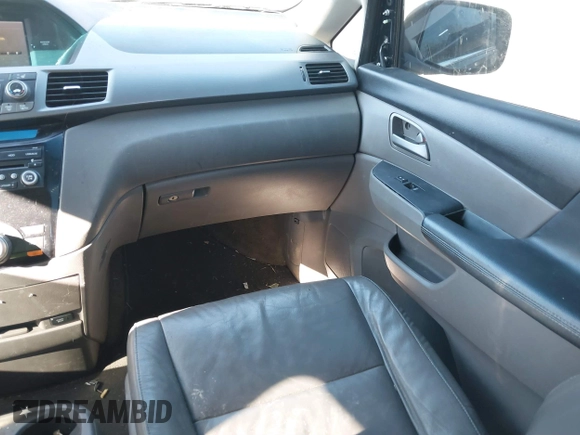 2012 Honda Odyssey EX-L with VIN 5FNRL5H69CB017227, listed as a IAAI auction lot 41345254 with 136,775 mi miles and . Bid and sale history available at carsss.com. Image 5.