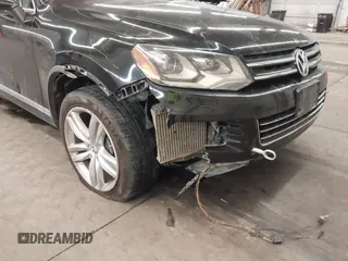 2011 Volkswagen Touareg Sport с VIN WVGFK9BP2BD001256, выставлен на аукционе IAAI как лот 41503097 с пробегом 201 301 миль миль и . История ставок и продаж доступна на DreamBid. Изображение 6.