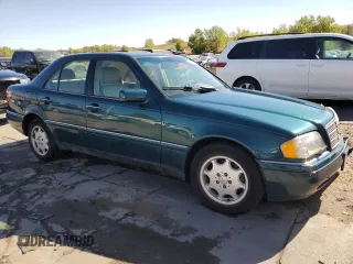 1997 Mercedes-Benz C with VIN WDBHA23EXVF507185, listed as a Copart auction lot 73716364 with 167,171 mi miles and Salvage title. Bid and sale history available at DreamBid. Image 4.