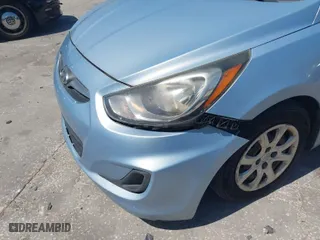2014 Hyundai Accent GLS with VIN KMHCT4AE2EU608104, listed as a IAAI auction lot 41943590 with 125,808 mi miles. Bid and sale history available at carsss.com. Image 6.