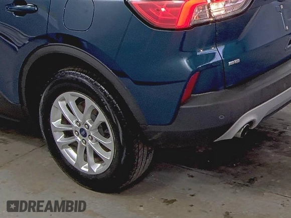 2020 Ford Escape SE with VIN 1FMCU9G65LUB80892, listed as a IAAI auction lot 42715723 with 86,362 mi miles and . Bid and sale history available at DreamBid. Image 22.