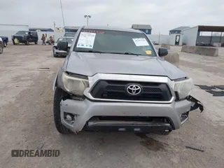 2014 Toyota Tacoma PreRunner with VIN 5TFJU4GN7EX058283, listed as a IAAI auction lot 41797328 with 101,811 mi miles. Bid and sale history available at carsss.com. Image 12.