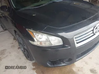 2014 Nissan Maxima S with VIN 1N4AA5AP9EC476138, listed as a IAAI auction lot 42732164 with 105,724 mi miles and . Bid and sale history available at DreamBid. Image 6.