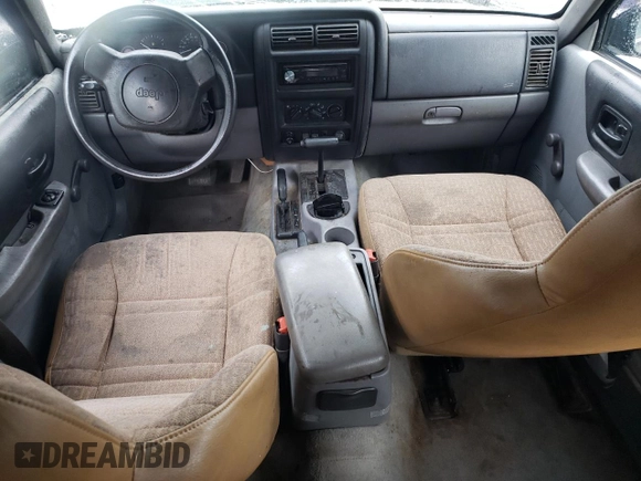 1997 Jeep Cherokee SE с VIN 1J4FJ28S5VL509588, выставлен на аукционе Copart как лот 56181695 с пробегом 313 430 миль миль и Списание • Salvage title. История ставок и продаж доступна на DreamBid. Изображение 8.