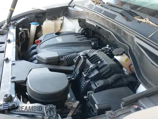 2016 Hyundai Santa Fe z VIN 5XYZTDLB1GG327689, wystawiony jako IAAI lot #43518068 z przebiegiem 181 602 mil mil oraz . Historia ofert i sprzedaży dostępna na DreamBid. Obrazek 19.