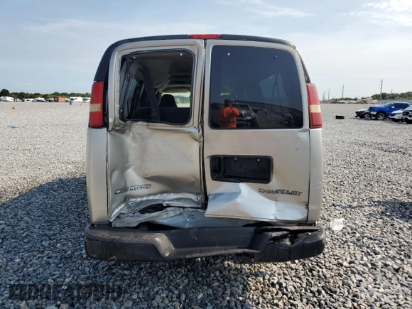 2004 Chevrolet Express Passenger with VIN 1GAHG39U741128458, listed as a Copart auction lot 64436215 with 118,387 mi miles and Salvage title. Bid and sale history available at DreamBid. Image 6.