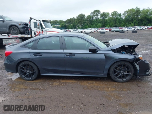 2023 Honda Civic Sport with VIN 2HGFE2F5XPH515699, listed as a IAAI auction lot 42441217 with 44,595 mi miles and . Bid and sale history available at DreamBid. Image 13.