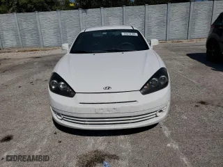 2007 Hyundai Tiburon GS with VIN KMHHM66D67U248918, listed as a Copart auction lot 77618184 with 145,703 mi miles and Salvage Title. Bid and sale history available at carsss.com. Image 5.