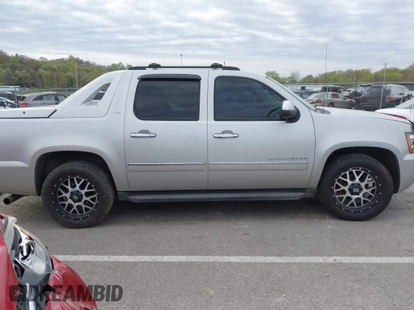 2011 Chevrolet Avalanche LTZ with VIN 3GNTKGE36BG337863, listed as a IAAI auction lot 42026377 with 207,116 mi miles and . Bid and sale history available at DreamBid. Image 14.