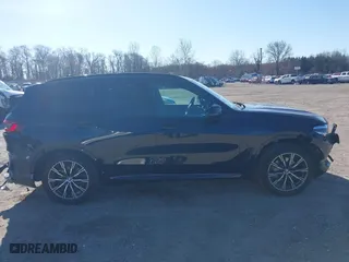 2021 BMW X5 xDrive40i with VIN 5UXCR6C09M9F83785, listed as a IAAI auction lot 41828697 with 57,863 mi miles. Bid and sale history available at carsss.com. Image 13.