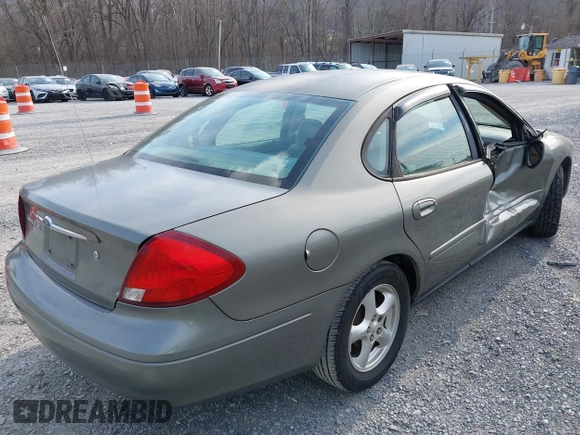2002 Ford Taurus SE Standard with VIN 1FAFP53U72A145136, listed as a IAAI auction lot 41768868 with 209,765 mi miles and . Bid and sale history available at DreamBid. Image 4.