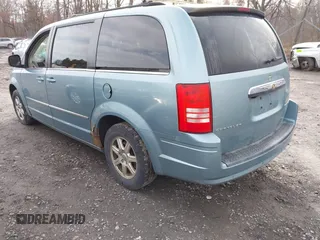 2010 Chrysler Town & Country Touring with VIN 2A4RR5D15AR415362, listed as a IAAI auction lot 41989057 with 133,406 mi miles and . Bid and sale history available at DreamBid. Image 3.