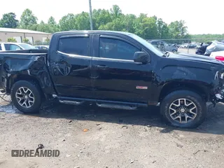 2016 GMC Canyon 4WD SLE z VIN 1GTG6CE35G1171168, wystawiony jako IAAI lot #42275447 z przebiegiem 171 581 mil mil oraz . Historia ofert i sprzedaży dostępna na DreamBid. Obrazek 13.