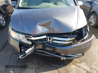 2015 Honda Odyssey Touring Elite z VIN 5FNRL5H9XFB067679, wystawiony jako IAAI lot #41913306 z przebiegiem 199 482 mil mil oraz . Historia ofert i sprzedaży dostępna na DreamBid. Obrazek 10.