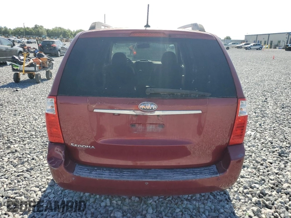2010 Kia Sedona LX with VIN KNDMG4C31A6337771, listed as a Copart auction lot 54542215 with 128,825 mi miles and Clean Title. Bid and sale history available at carsss.com. Image 6.