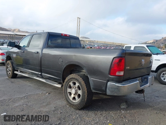 2017 Ram 2500 SLT z VIN 3C6UR5JL4HG570952, wystawiony jako IAAI lot #41456094 z przebiegiem 245 785 mil mil oraz . Historia ofert i sprzedaży dostępna na DreamBid. Obrazek 3.
