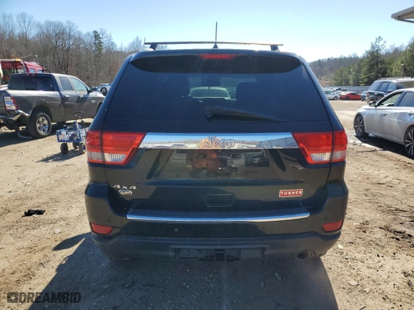 2012 Jeep Grand Cherokee Overland with VIN 1C4RJFCG0CC232021, listed as a Copart auction lot 89358695 with 129,196 mi miles and Salvage Title. Bid and sale history available at carsss.com. Image 6.