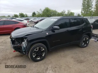 2017 Jeep Compass Trailhawk with VIN 3C4NJDDB4HT649028, listed as a Copart auction lot 58652795 with 70,630 mi miles and Salvage title. Bid and sale history available at DreamBid. Image 1.