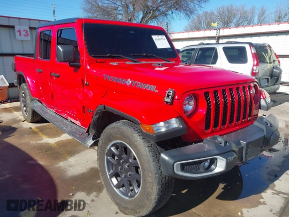 2021 Jeep Gladiator Freedom z VIN 1C6HJTAG7ML609661, wystawiony jako IAAI lot #41410756 z przebiegiem 44 636 mil mil oraz . Historia ofert i sprzedaży dostępna na DreamBid. Obrazek 1.