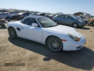 1999 Porsche Boxster с VIN WP0CA2981XU626335, выставлен на аукционе Copart как лот 58570495 с пробегом 140 751 миль миль и Списание • Salvage title. История ставок и продаж доступна на DreamBid. Изображение 4.