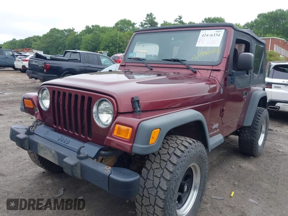 2004 Jeep Wrangler SE with VIN 1J4FA291X4P720783, listed as a IAAI auction lot 42446334 with 69,672 mi miles and . Bid and sale history available at DreamBid. Image 2.