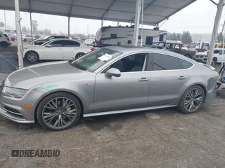 2016 Audi A7 3.0 Premium Plus with VIN WAUWGAFC0GN003357, listed as a IAAI auction lot 41468854 with 62,590 mi miles. Bid and sale history available at carsss.com. Image 14.