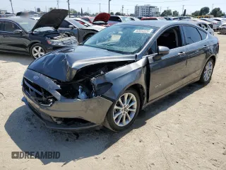 2017 Ford Fusion Hybrid SE with VIN 3FA6P0LU0HR355272, listed as a Copart auction lot 62834325 with 147,572 mi miles and Clean title. Bid and sale history available at DreamBid. Image 1.