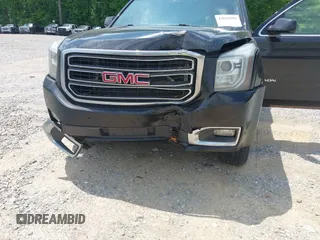 2015 GMC Yukon SLT with VIN 1GKS2BKC5FR275085, listed as a IAAI auction lot 42025693 with Not Provided miles. Bid and sale history available at carsss.com. Image 6.
