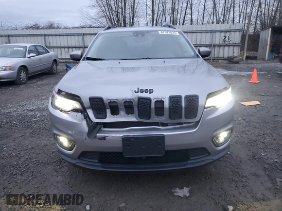 2021 Jeep Cherokee Latitude Plus z VIN 1C4PJLLBXMD143997, wystawiony jako Copart lot #87973025 z przebiegiem 64 267 mil mil oraz Szkoda całkowita • Salvage title. Historia ofert i sprzedaży dostępna na DreamBid. Obrazek 5.