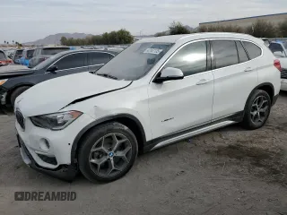 2018 BMW X1 sDrive28i with VIN WBXHU7C37J5H44386, listed as a Copart auction lot 42167135 with 96,668 mi miles and Salvage Title. Bid and sale history available at carsss.com. Image 1.
