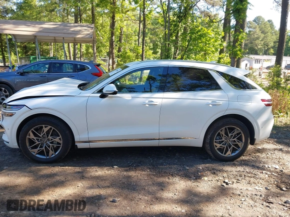 2023 Genesis GV70 2.5T z VIN KMUMADTB9PU098982, wystawiony jako IAAI lot #42335587 z przebiegiem 20 215 mil mil oraz . Historia ofert i sprzedaży dostępna na DreamBid. Obrazek 14.
