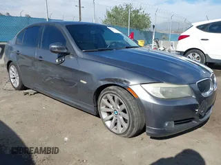 2011 BMW 3 Series 328i with VIN WBAPH5G55BNM71702, listed as a IAAI auction lot 42013598 with 192,744 mi miles. Bid and sale history available at carsss.com. Image 1.