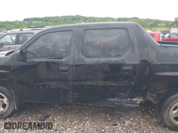 2007 Honda Ridgeline RT with VIN 2HJYK16267H510110, listed as a IAAI auction lot 42145367 with 170,451 mi miles and . Bid and sale history available at DreamBid. Image 14.