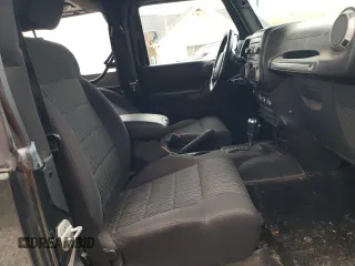 2011 Jeep Wrangler Sport with VIN 1J4AA2D18BL505697, listed as a Copart auction lot 53162175 with 144,024 mi miles and Clean Title. Bid and sale history available at carsss.com. Image 10.