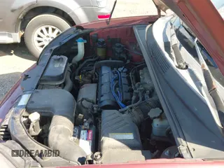 2005 Hyundai Tucson GL z VIN KM8JM12B75U066943, wystawiony jako IAAI lot #42947669 z przebiegiem 163 853 mil mil oraz . Historia ofert i sprzedaży dostępna na DreamBid. Obrazek 13.