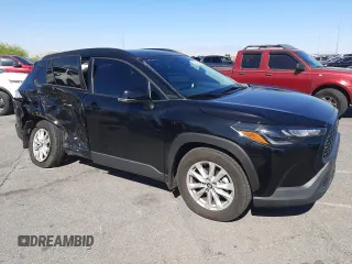 2022 Toyota Corolla Cross LE with VIN 7MUCAABG1NV033299, listed as a Copart auction lot 58018825 with 28,138 mi miles and Salvage title. Bid and sale history available at DreamBid. Image 4.