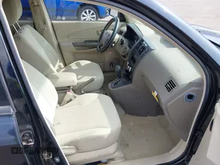 2006 Hyundai Tucson GL with VIN KM8JM12B26U340745, listed as a IAAI auction lot 42129680 with 87,133 mi miles. Bid and sale history available at carsss.com. Image 5.
