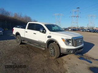 2018 Nissan Titan XD SV with VIN 1N6BA1F45JN521996, listed as a IAAI auction lot 41757881 with 98,886 mi miles. Bid and sale history available at carsss.com. Image 1.