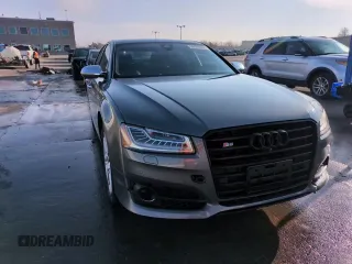 2015 Audi S8 с VIN WAUK2AFDXFN017156, выставлен на аукционе Copart как лот 50602605 с пробегом 100 224 миль миль и Списание • Salvage title. История ставок и продаж доступна на DreamBid. Изображение 14.