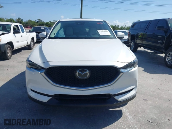 2018 Mazda CX-5 Grand Touring with VIN JM3KFADM2J1422512, listed as a IAAI auction lot 42010801 with 48,567 mi miles and . Bid and sale history available at DreamBid. Image 12.