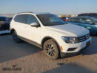 2021 Volkswagen Tiguan S with VIN 3VV1B7AX1MM002556, listed as a IAAI auction lot 40592120 with 55,222 mi miles. Bid and sale history available at carsss.com. Image 1.