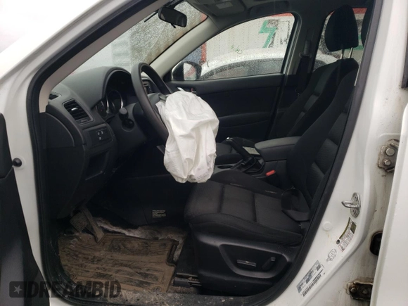 2014 Mazda CX-5 Touring z VIN JM3KE4CY1E0406726, wystawiony jako Copart lot #54652065 z przebiegiem 245 491 mil mil oraz Szkoda całkowita • Salvage title. Historia ofert i sprzedaży dostępna na DreamBid. Obrazek 7.