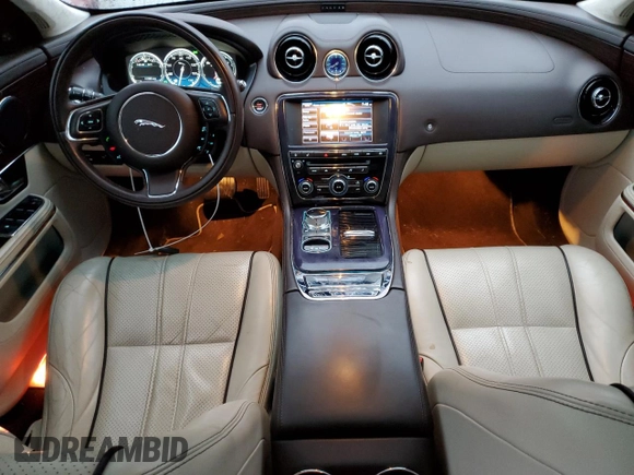 2013 Jaguar XJ Portfolio z VIN SAJWJ2GD0D8V47886, wystawiony jako Copart lot #42612345 z przebiegiem 117 383 mil mil oraz Szkody całkowita. Historia ofert i sprzedaży dostępna na DreamBid. Obrazek 8.